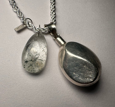 Shamanic quartz drop and antique silver scent bottle